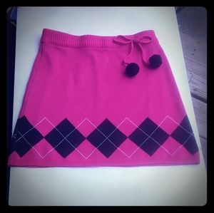 Missunderstood sweater skirt with pull tie pom